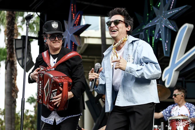 A photo of Kinky performing in the Centerfield Plaza.