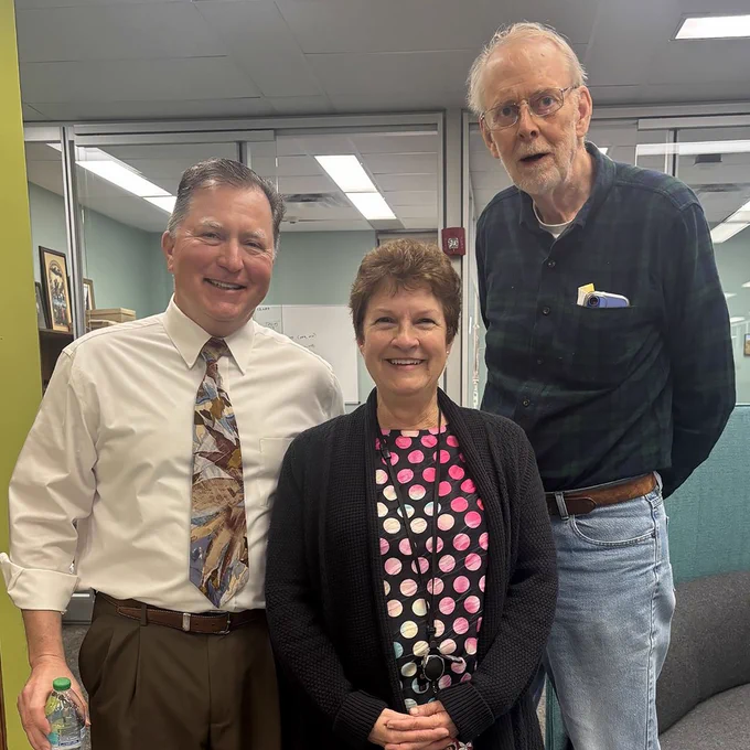 Lori flanked by two generations of leadership: At left, Stephen Gavazzi, the current director she's retiring under, and at right, Randy Olsen, the former director that first hired her.