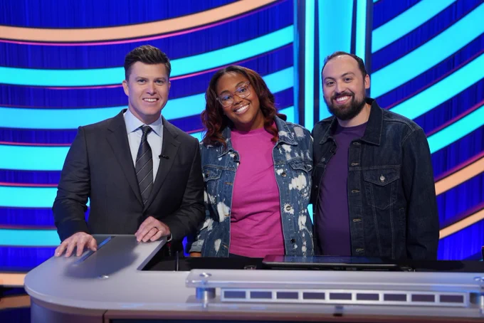 Pop Culture Jeopardy! host Colin Jost with Jahncie Cook and her husband, Nik Berry.