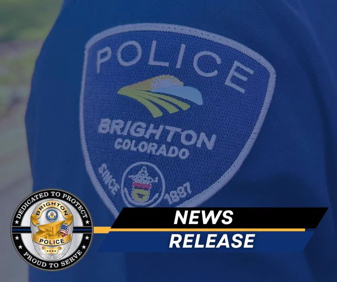 Close-up of Brighton, Colorado police patch on a blue uniform sleeve with a news release banner overlay.
