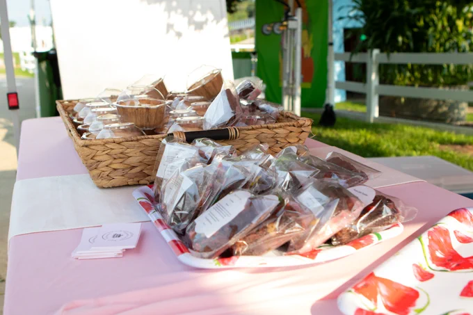 A table with a selection of baked goods. 