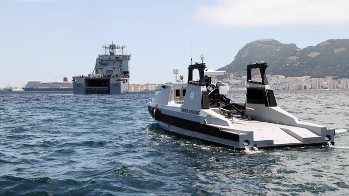 RNMB Ariadne sails towards RFA Lyme Bay as she prepares to dock for the first time in the mine-hunting mothership