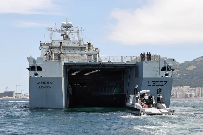 RNMB Ariadne sails towards RFA Lyme Bay as she prepares to dock for the first time in the mine-hunting mothership