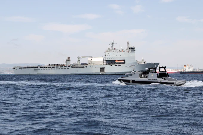 RNMB Ariadne sails towards RFA Lyme Bay as she prepares to dock for the first time in the mine-hunting mothership