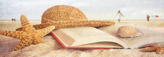 image with a book in the sand