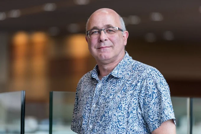 This is a picture of Professor Michael Way standing in the foreground.
