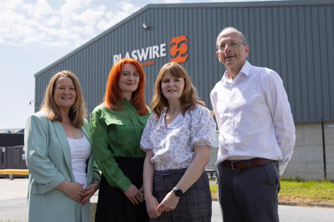 Photograph of Margaret McCabe, Belfast Met, Centre Manager for Business Development; Jo McCrea-Curley, Engagement Lead NI EIZ MCHLG; Economy Minister Dr Caoimhe Archibald and Andrew Billingsley, Founder and CEO, Plaswire.