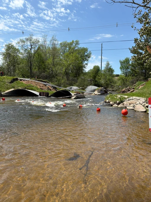 roadway washed away by floodwaters