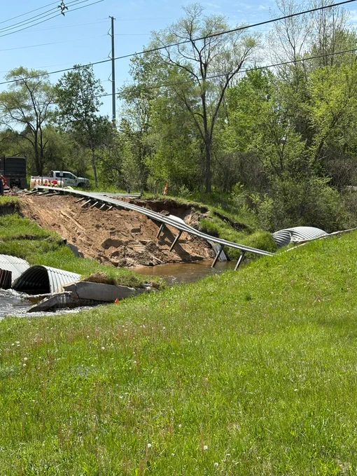 roadway washed away by floodwaters
