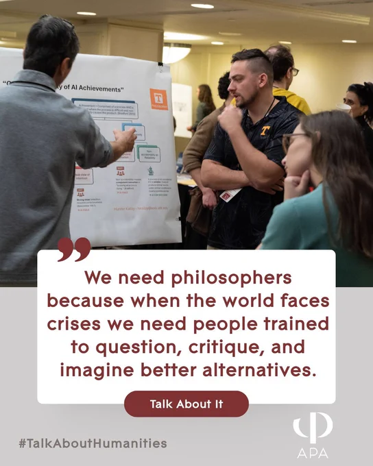 Philosophers discussing a research poster at an APA meeting.