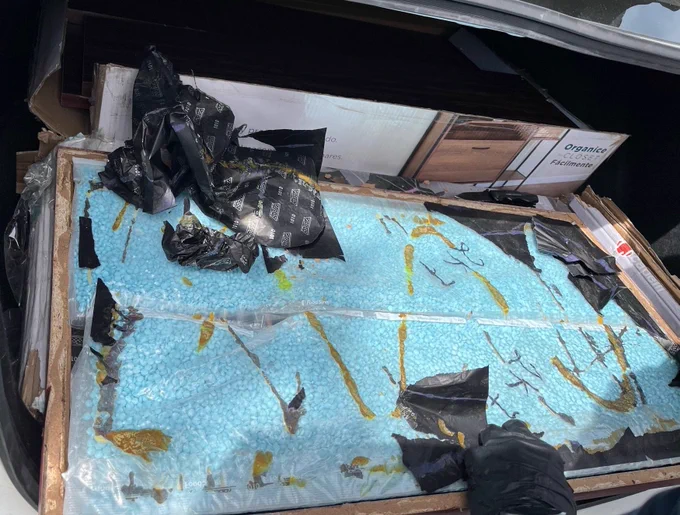 Pills found inside furniture- shown here inside car trunk