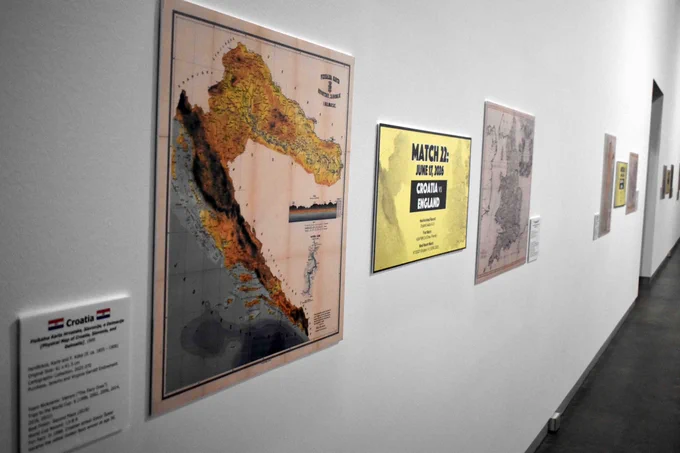 Pictured is a photo of historic maps that are on display as a part of the Atlas of Champions exhibit at the Arlington Museum of Art. 