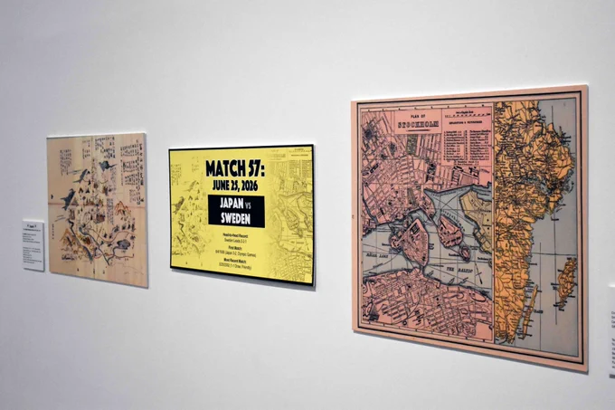 Pictured is a photo of historic maps that are on display as part of the Atlas of Champions exhibit at the Arlington Museum of Art.