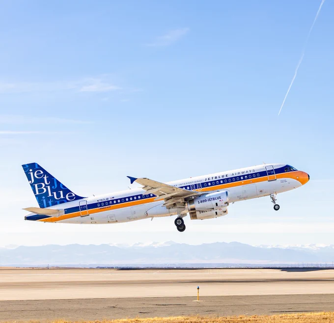 The JetBlue retrojet departs from DEN.