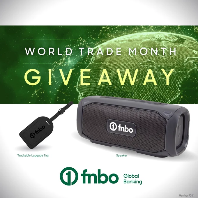 Promotional image for FNBO Global Banking's "World Trade Month Giveaway" featuring a trackable luggage tag and a speaker with FNBO branding.