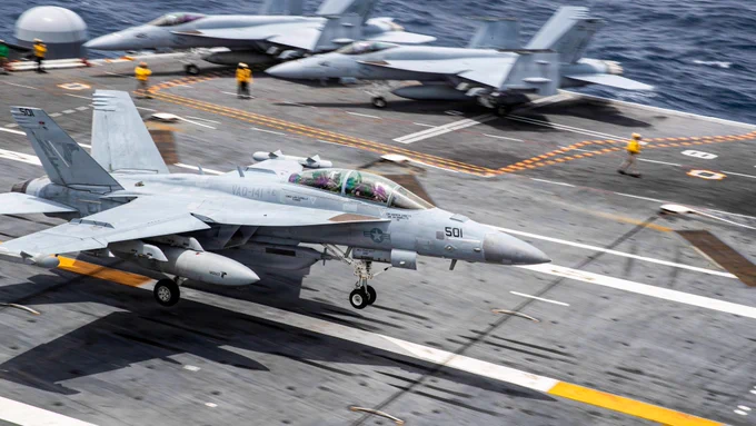 U.S. Navy sailors conduct flight operations while underway.