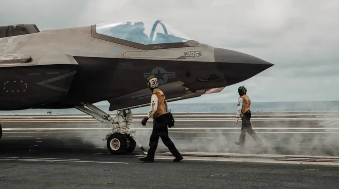 U.S. Navy sailors conduct flight operations while underway.