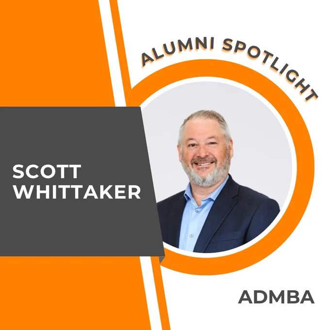 This image features a graphic titled "Alumni Spotlight" with a circular photo of a person smiling in a suit. The name "Scott Whittaker" is displayed on a gray rectangle. The term "ADMBA" appears at the bottom right. The design includes orange and gray elements.