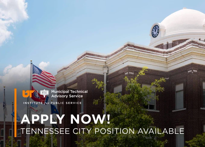 Historic brick courthouse with a white dome and clock under a blue sky, featuring an American flag and text about a Tennessee city job opening.