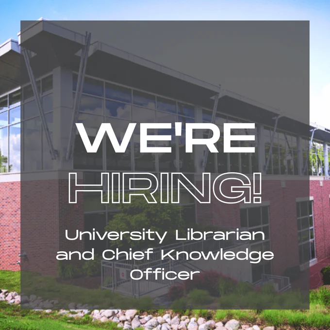 A modern building with glass windows and steel framework, overlaid with the text "We're Hiring! University Librarian and Chief Knowledge Officer."