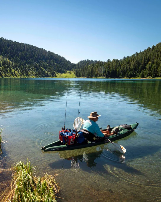 Man in a boat. Photo by Preston Keres. 