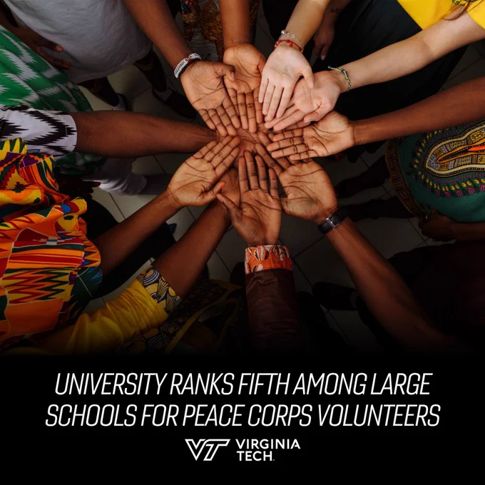 Hands are seen palm up, together in a circle. Text on screen reads: University ranks fifth among large schools for Peace Corps volunteers