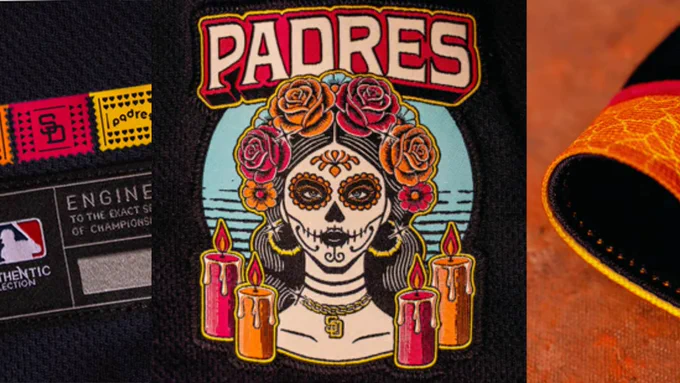 The image features a patch with "Padres" written above a stylized Day of the Dead skull adorned with flowers. In front, there are candles. On the left, there's a close-up of a clothing label with "SD" and "Padres" logos, and text reading "Engineered to the exact specifications of championship athletes" and "Authentic Collection." On the right, there's an edge of colorful fabric.