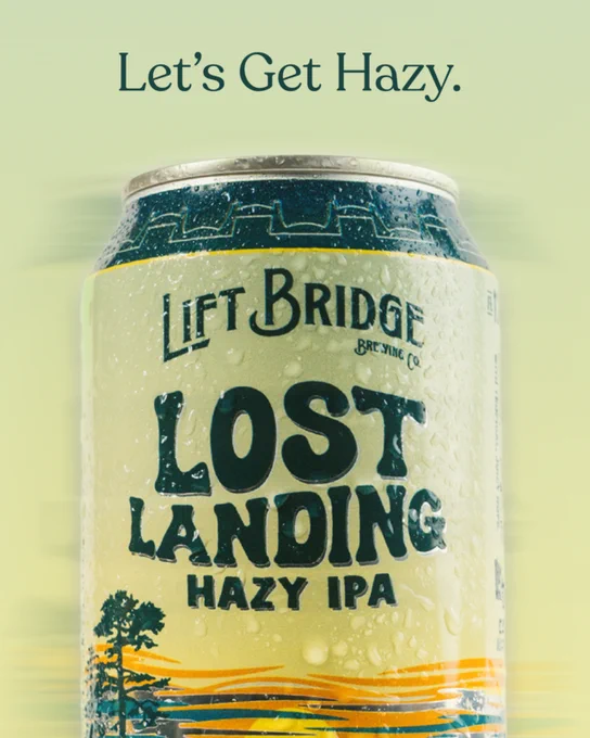 Close-up shot of a Lift Bridge Brewing Co.'s Lost Landing Hazy IPA can with water droplets. The image has a refreshing and inviting mood.
