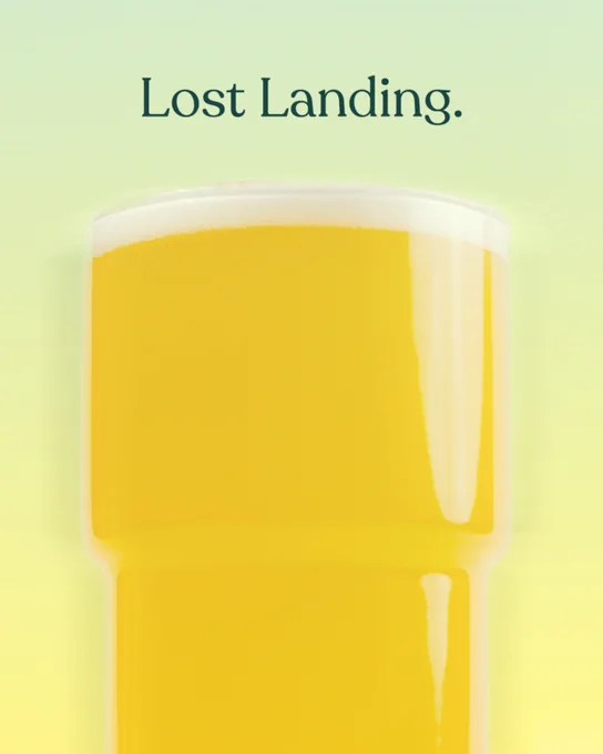 A minimalist image featuring a glass of yellow beer against a green gradient background with the text 'Lost Landing.' The design is clean and summery.