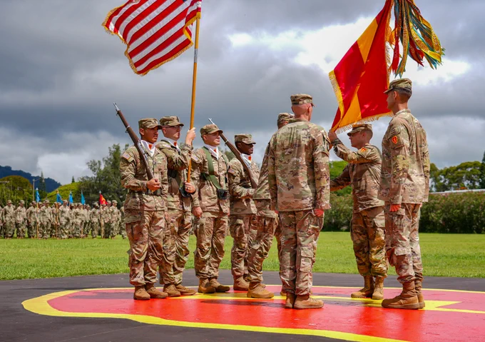 U.S. Soldier Colonel Daniel J. Von Benken, former 25th Infantry Division Artillery Commander, passes the guidon during his change of responsibility ceremony on Schofield Barracks, Hawaii, May, 27, 2026. (U.S. Army photo by Cpl. Adaris Cole)
