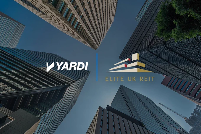 Skyscrapers viewed from below, with logos for Yardi and Elite UK REIT prominently displayed in the sky between the buildings.