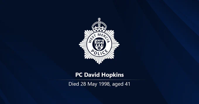 White West Mercia Police crest on a dark background with the name PC David Hopkins and the words: Died 28 May 1998, aged 41