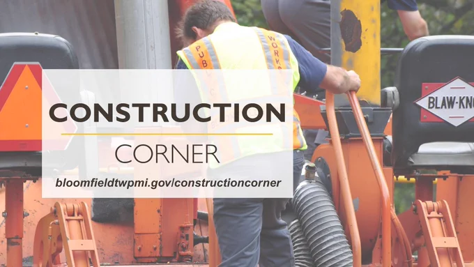 Construction worker wearing a public works safety vest with headline Construction Corner bloomfieldtwpmi.gov/constructioncorner.