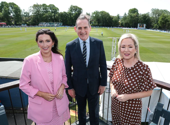 Image of three people at the Ireland v New Zealand Test match at Stormont - The First Minister and deputy First Minister with New Zealand High Commissioner, His Excellency Mr Hamish Cooper.