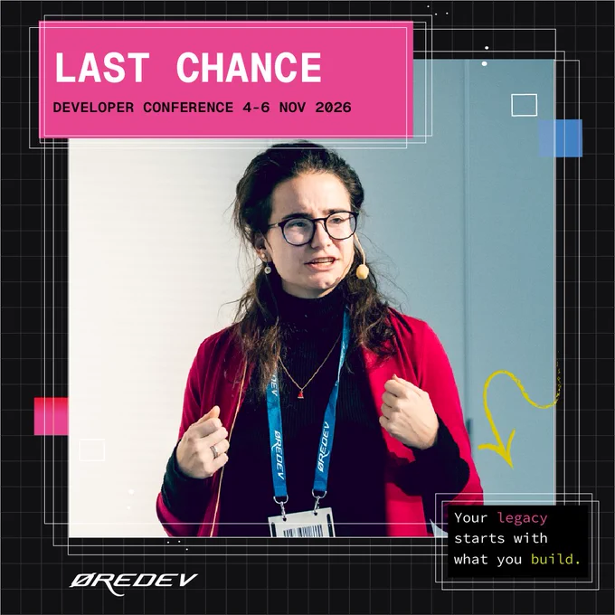 Speaker wearing a red jacket and conference badge at ØREDEV Developer Conference, promoting the event from November 4-6, 2026.