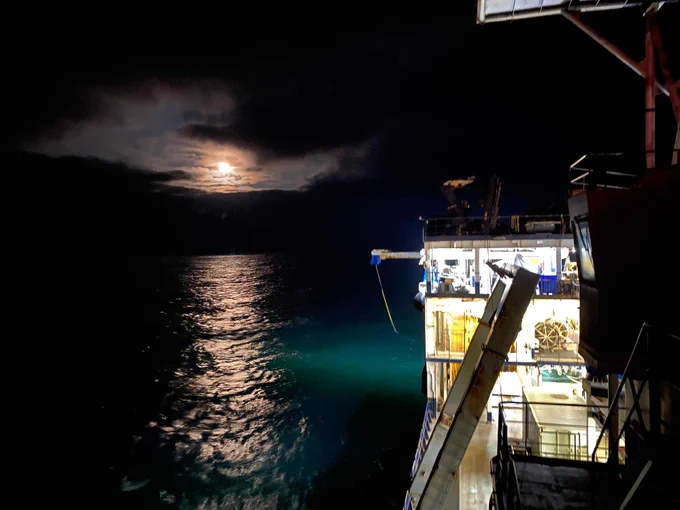 Lamont's R/V Marcus G. Langseth in the moonlight during the Queen Charlotte Fault Expedition, August 2021, Haida Gwaii. Credit: Cody Bahlau