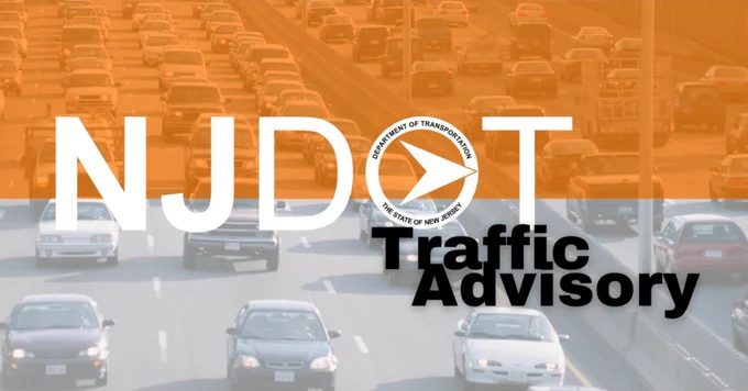 Heavy traffic congestion on a multi-lane highway under an orange overlay with NJDOT Traffic Advisory text.
