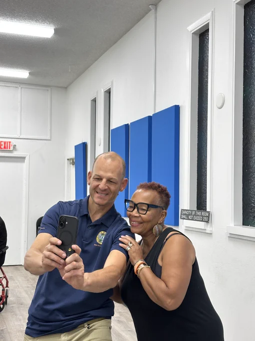 mayor taking a selfie with a constituent 