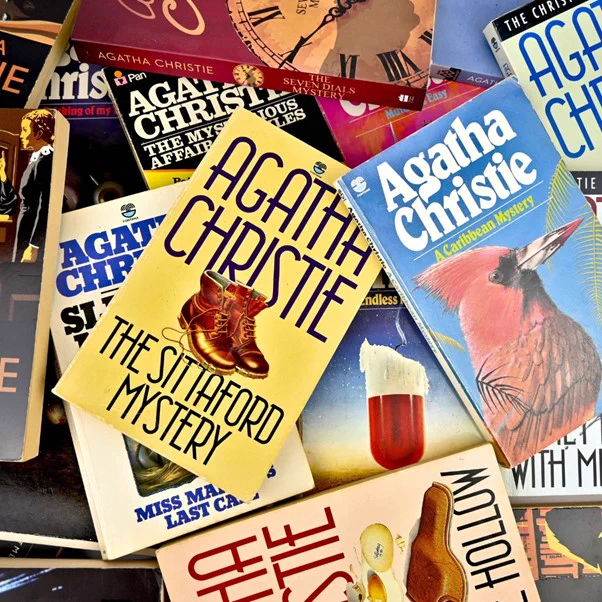 Poster of Agatha Christie book covers including the 'The Sittaford Mystery' and 'A Caribbean Mystery'.