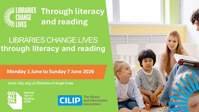 Three children sitting on the floor listening to an adult reading a book in a bright room promoting literacy and reading.
