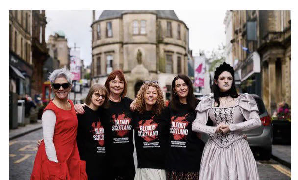 Frances on Stirling street with Denise Mina and Debut shortlist nominees Kirsty, May and Linda. Also spooky girl in horror costume