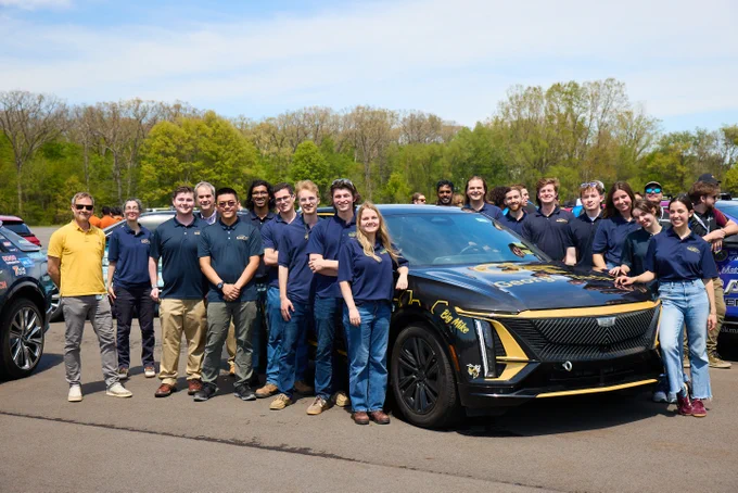 Members of the Georgia Tech EcoCAR EV Challenge team and Interim Dean Doug Williams with their Cadilac LYRIQ.