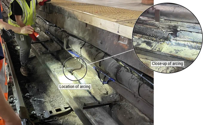 Postaccident examination of accident location and damaged third rail feeder cable (inset).