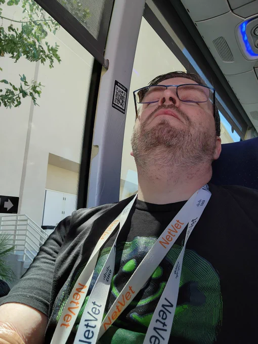 sleepy Ian in a hotel shuttle bus