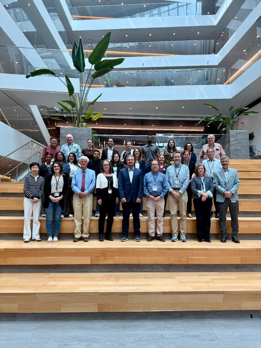 Group photo on the stairs in Anschutz Health Sciences Building. 