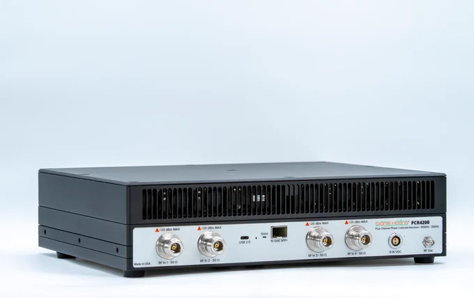 A Signal Hound PCR4200 phase-coherent receiver with various connection ports and indicator labels is shown on a plain background.