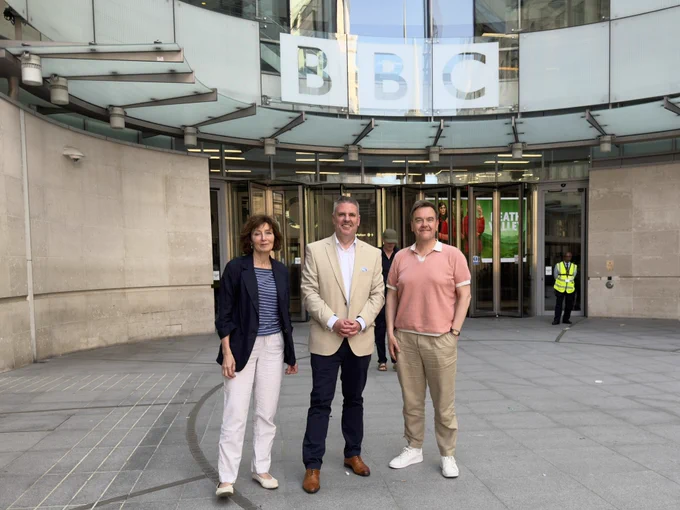 Pictured in front of the BBC building, from left to right: Emma Kingsley, David Holdsworth, Robert Williamson. 