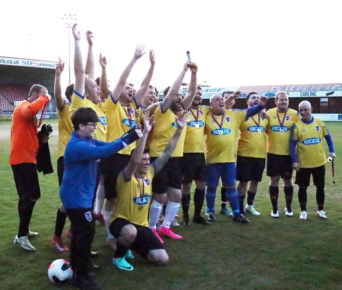 The Winning Sponsors with their trophy and medals