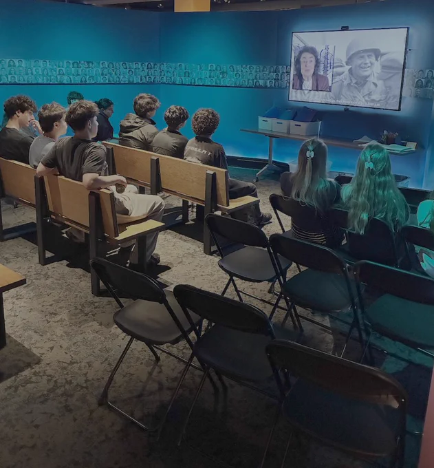 Students viewing film on the Holocaust.