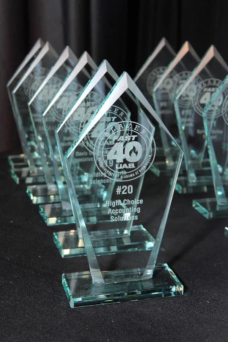 glass diamond shaped award that includes the blazer fast 40 logo